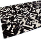 SQUARES – Black and White Patagonian Cowhide Rug