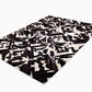 SQUARES – Black and White Patagonian Cowhide Rug