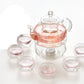 Tea set of tea pot with infuser + warmer and 6 double cups